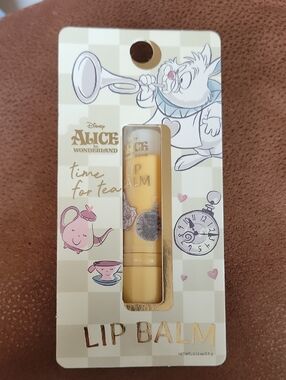 Disney Alice in Wonderland Yellow Lip Balm with Tea-Time Artwork